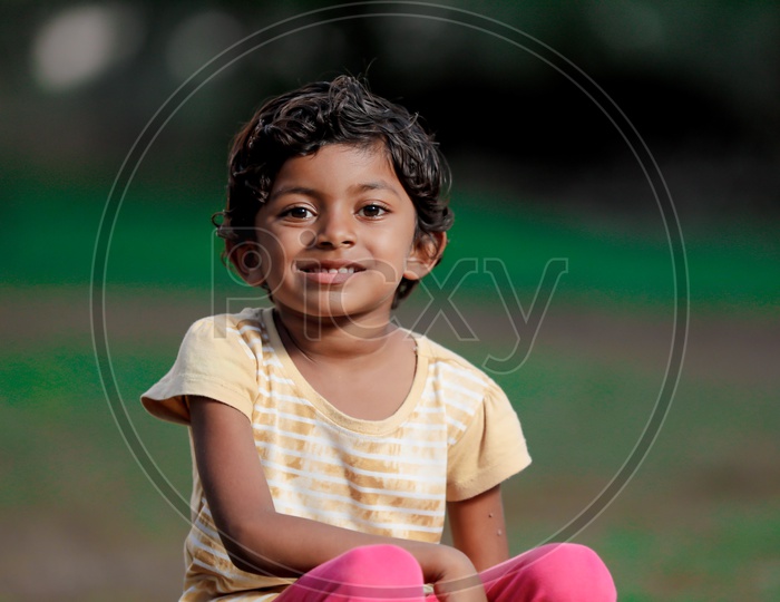 Indian Girl Child With Smiling Face Closeup Shot