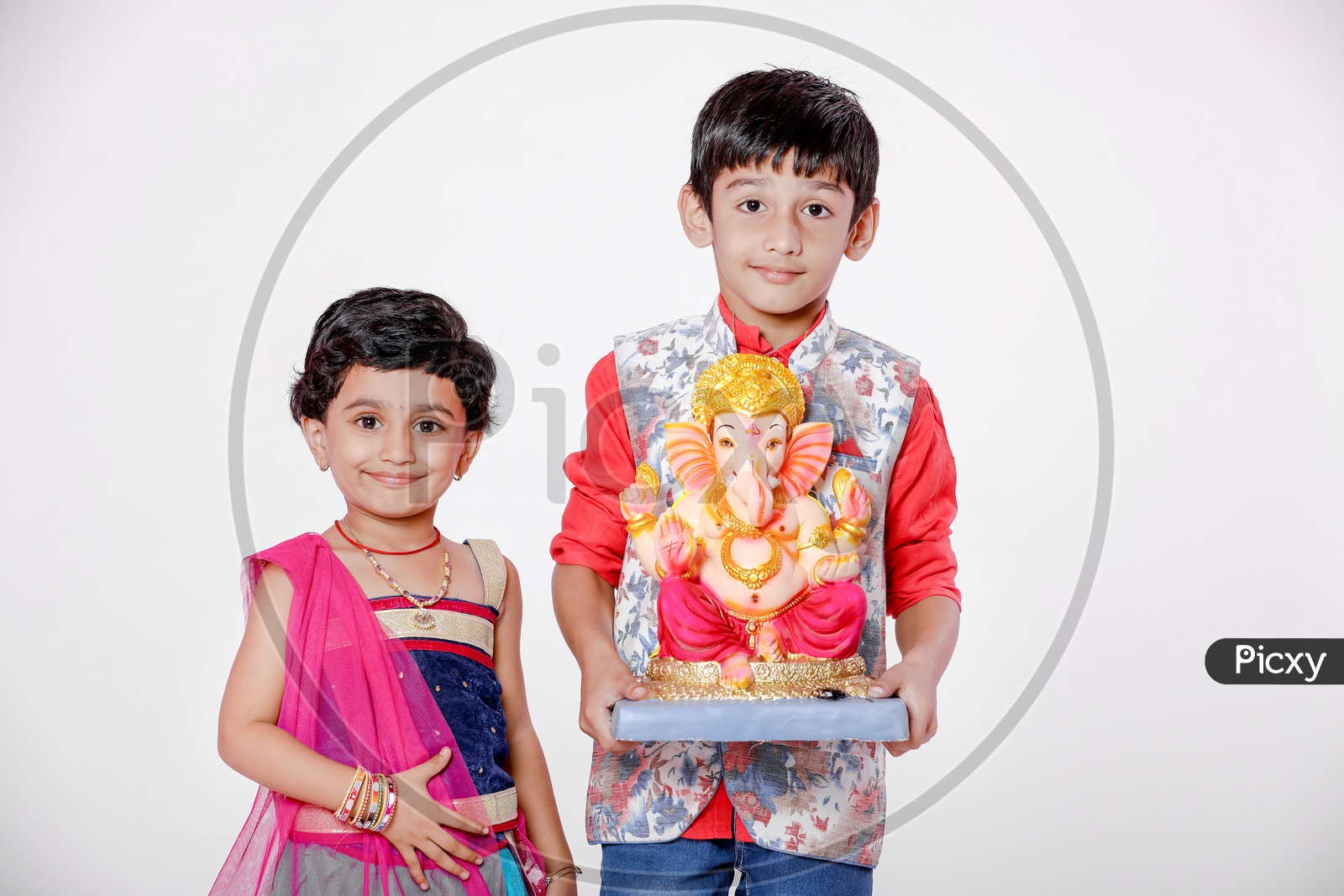 Indian Children with Lord Ganesh Idol
