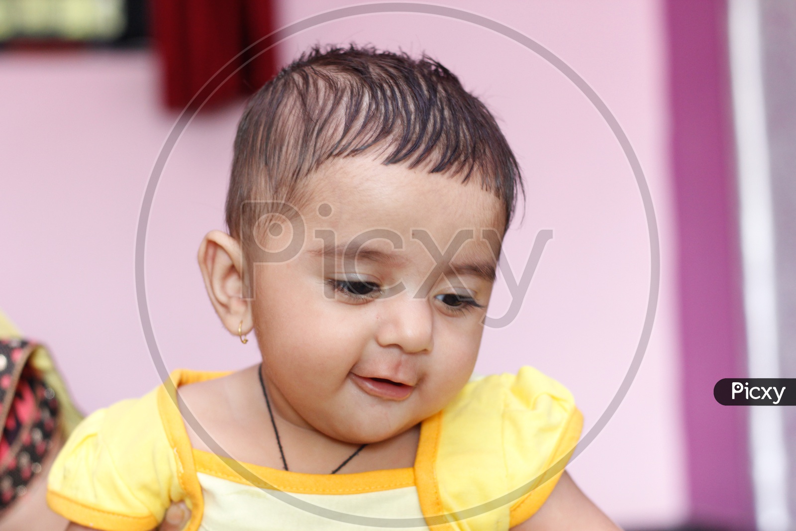 Image of Portrait Of a Cute Indian Baby-AM561546-Picxy