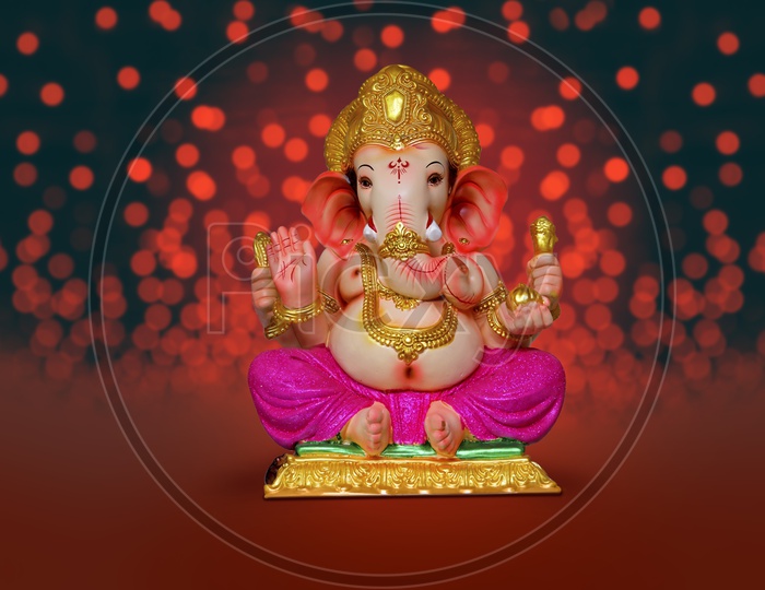 Lord Ganesha Idol with beautiful bokeh background / Ganesh Idol