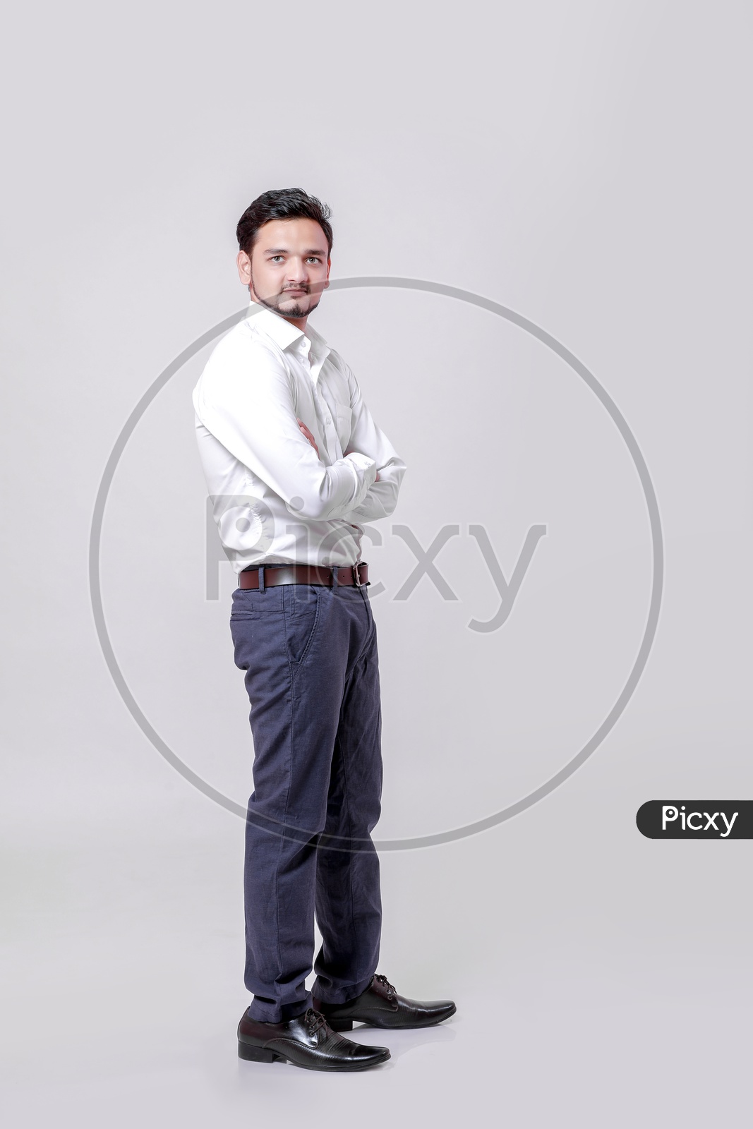 Indian Young Professional Man With a Smiling Face On an Isolated White Background