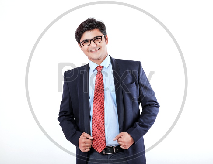 Indian Young Professional Man In Suite with a Smile On Face