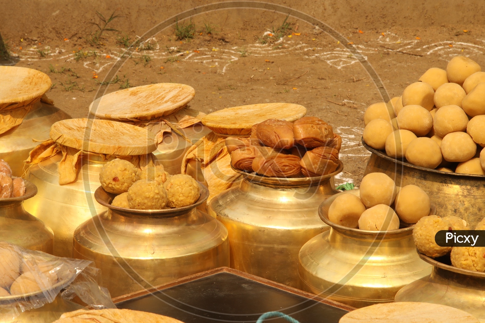 South Indian Sweets Savouries In Brass Bowls