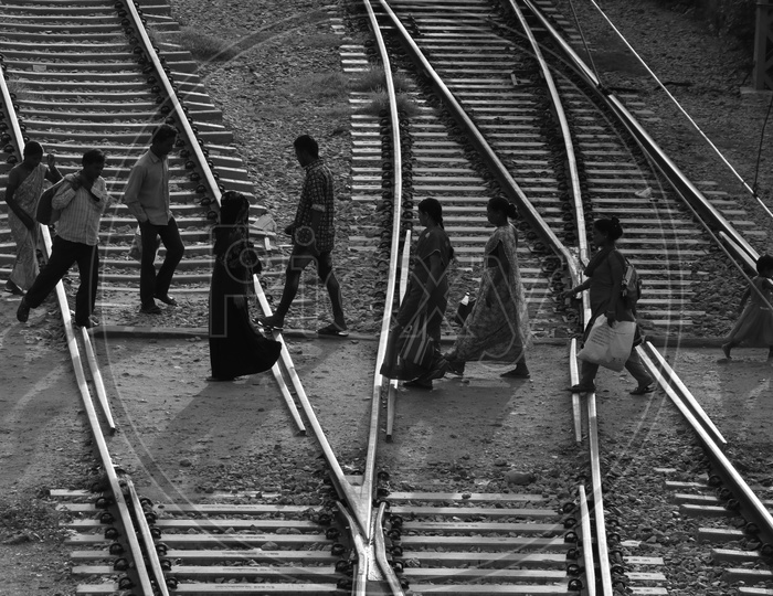 Pedestrians Crossing The railway Track