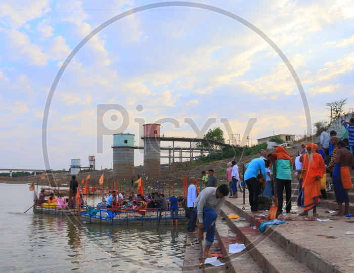 Pilgrims Taking holy Dips In River