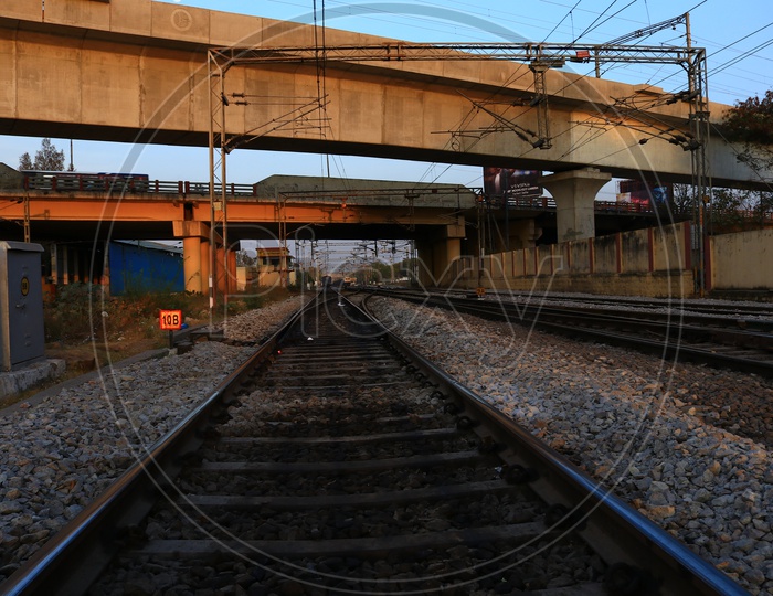 Railway track with a Flyover above It