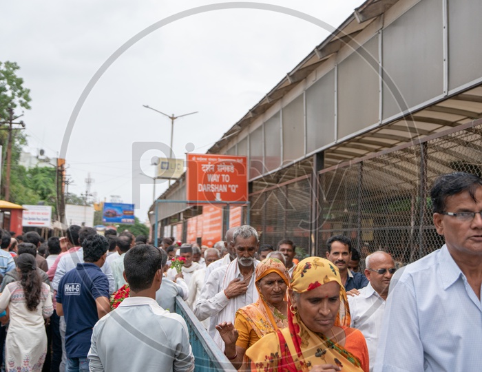 People waiting in Queue line  for Sai Baba Darshan
