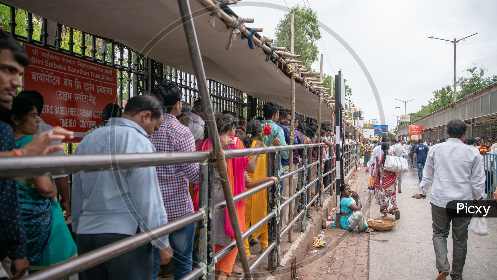 People waiting in Queue line  for Sai Baba Darshan