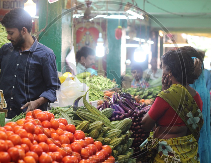 Vegetable Market Scene with buyers and sellers