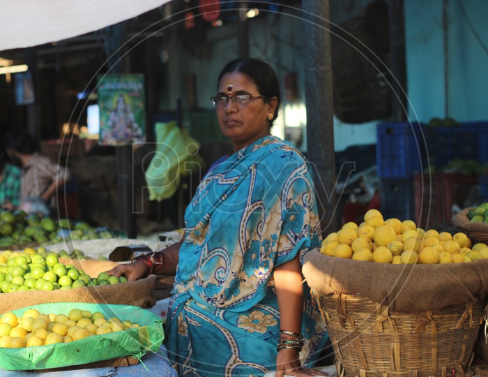 Woman Vegetable Seller at Vegetables Market