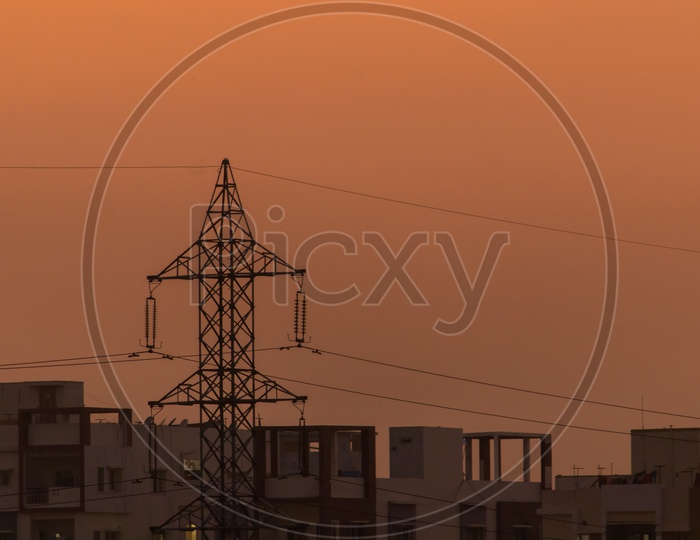 sunset with electrical tower