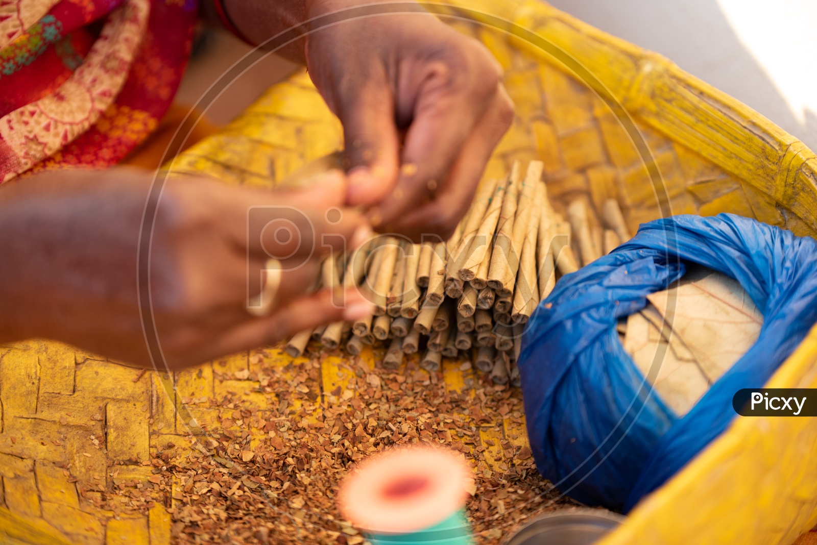 Indian Rural Woman Making Beedi for her livelihood in Telangana Villages