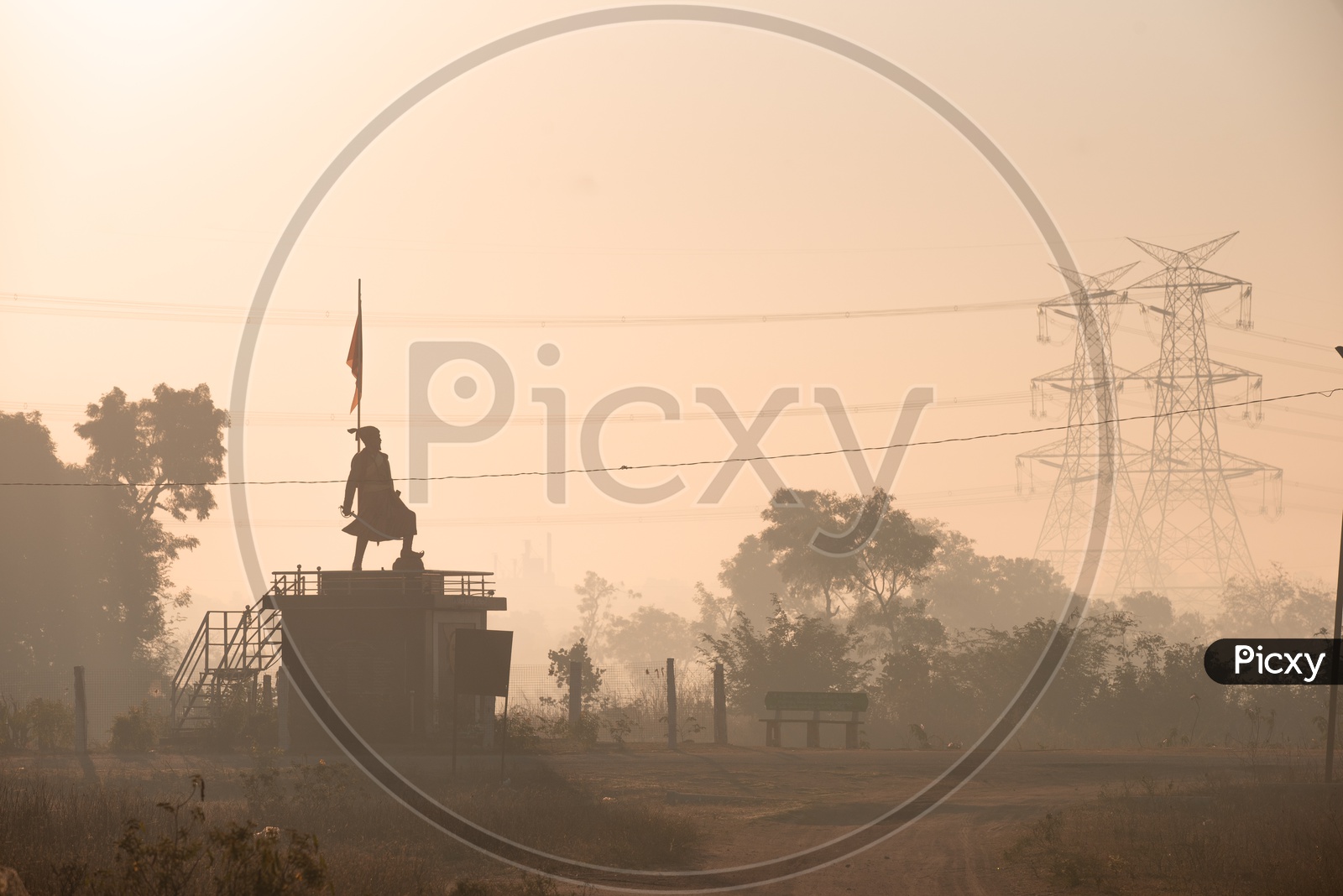 Chatrapathi Shivaji Statue in a Village on a Beautiful fog Background