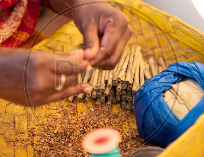 Indian Rural Woman Making Beedi for her livelihood in Telangana Villages