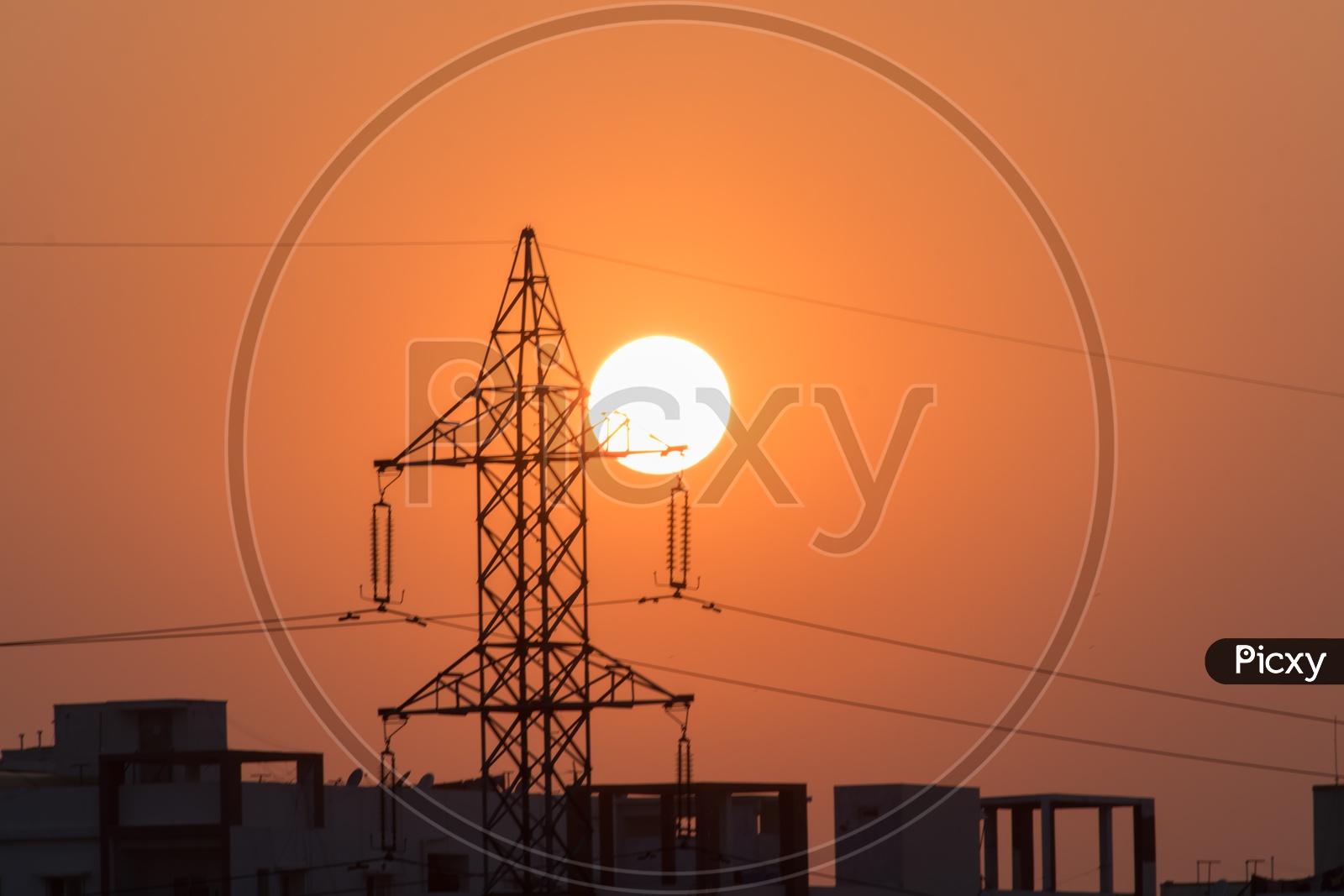 sunset with electrical tower