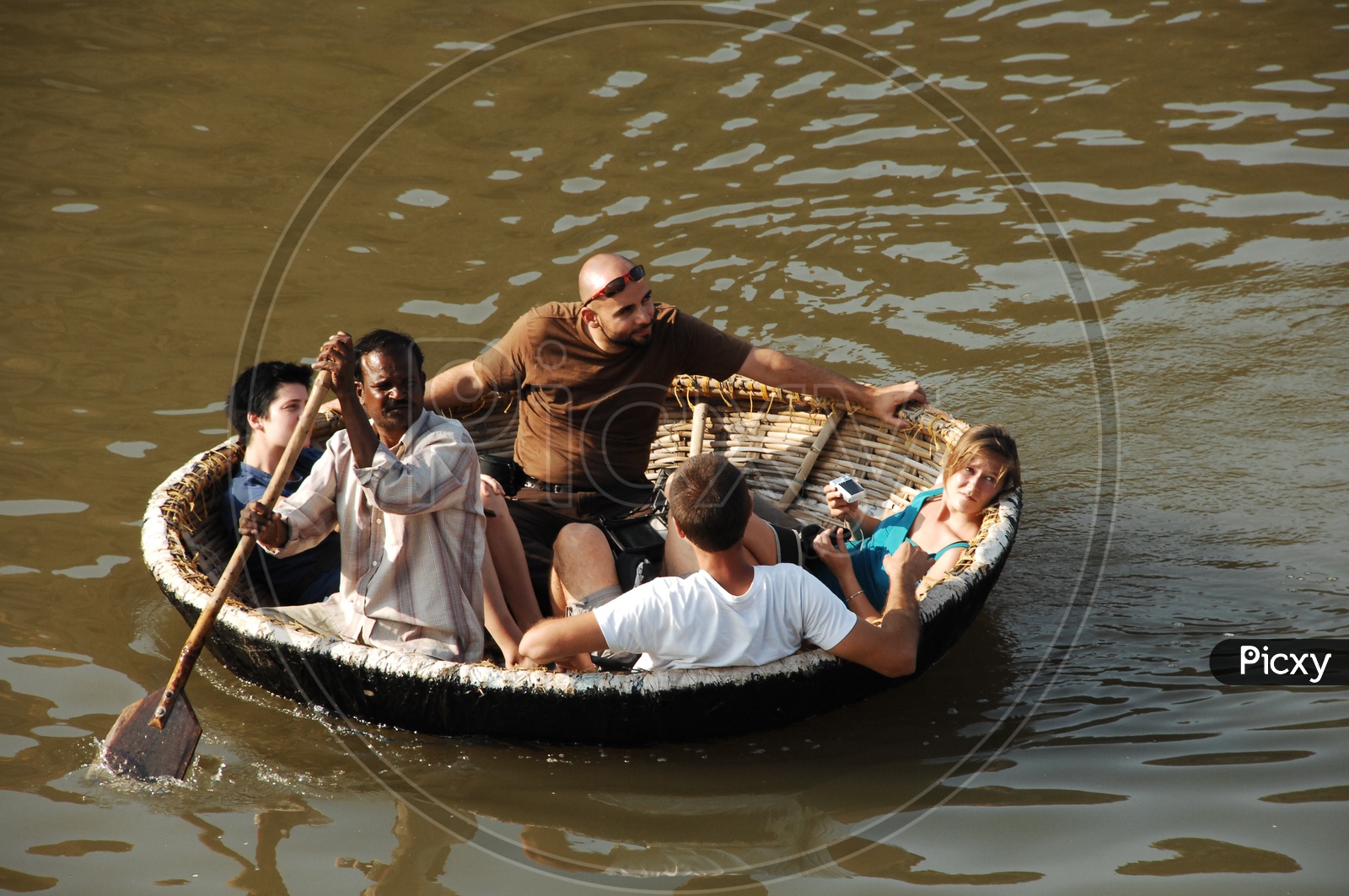 Foreigners on Indian Coracle Boats