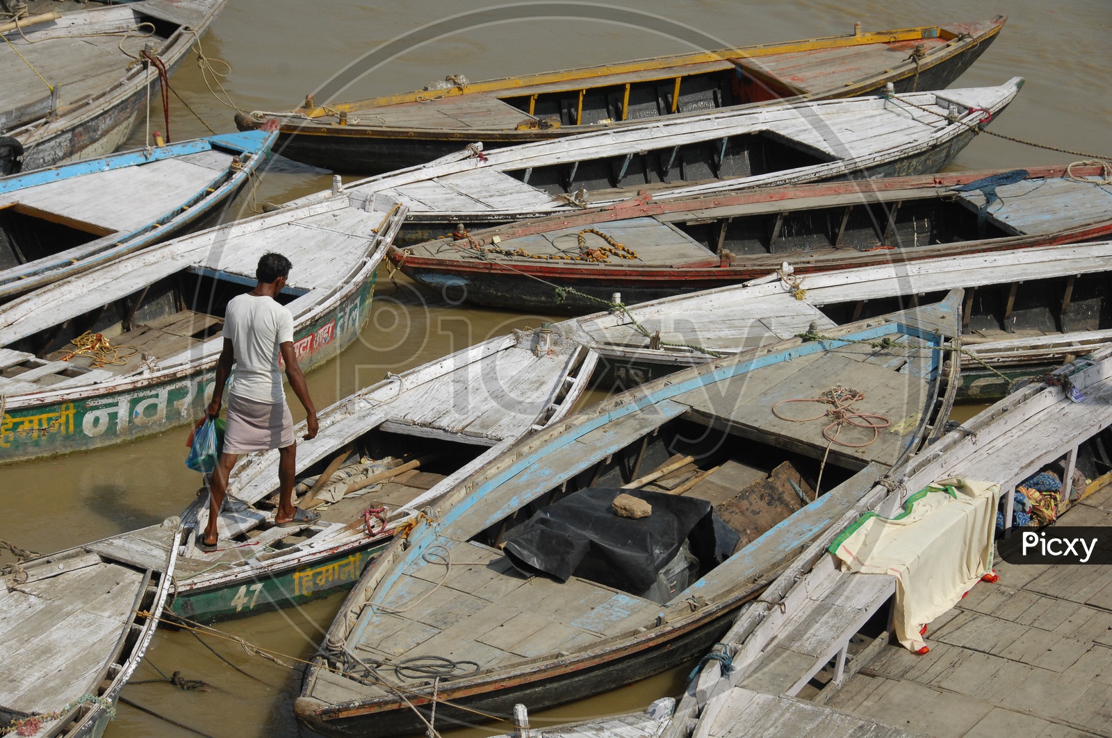 Sailing Boats On the Ganga River Banks