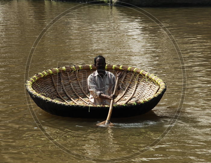 Indian People  Sailing on Coracle