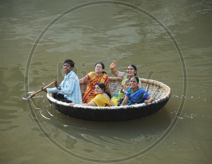 Indian Women in Coracle Boat In India