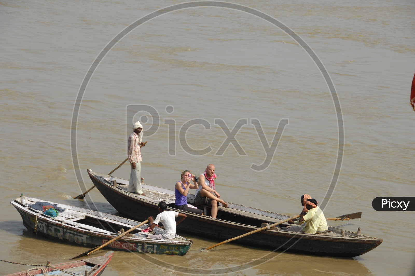 Foreigners On the Sailing Boats of varanasi