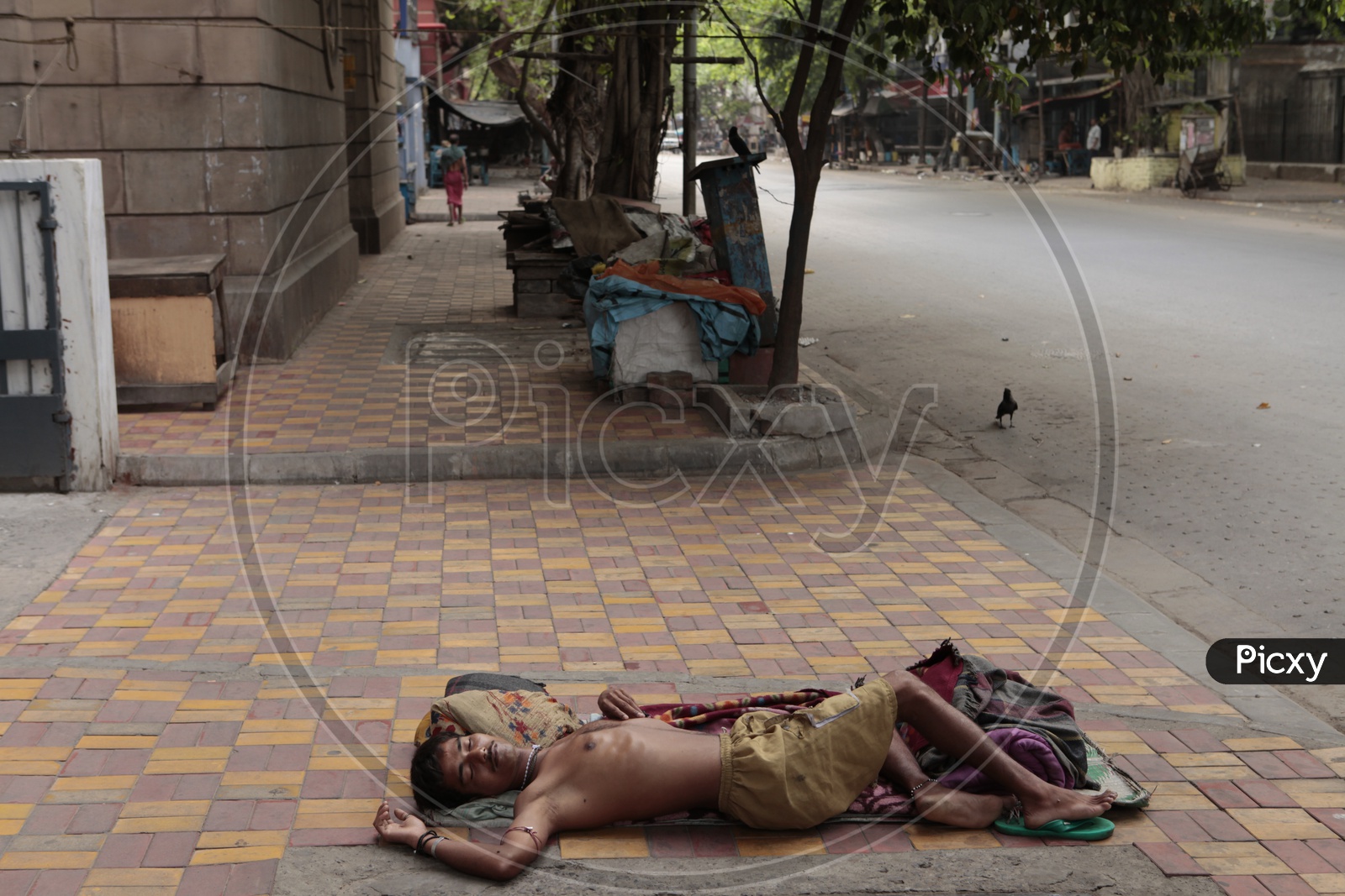 Indian Beggar  Sleeping On Footpaths Of India