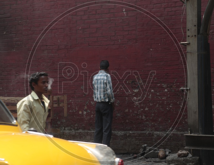 Indian Man Public urination on Roads