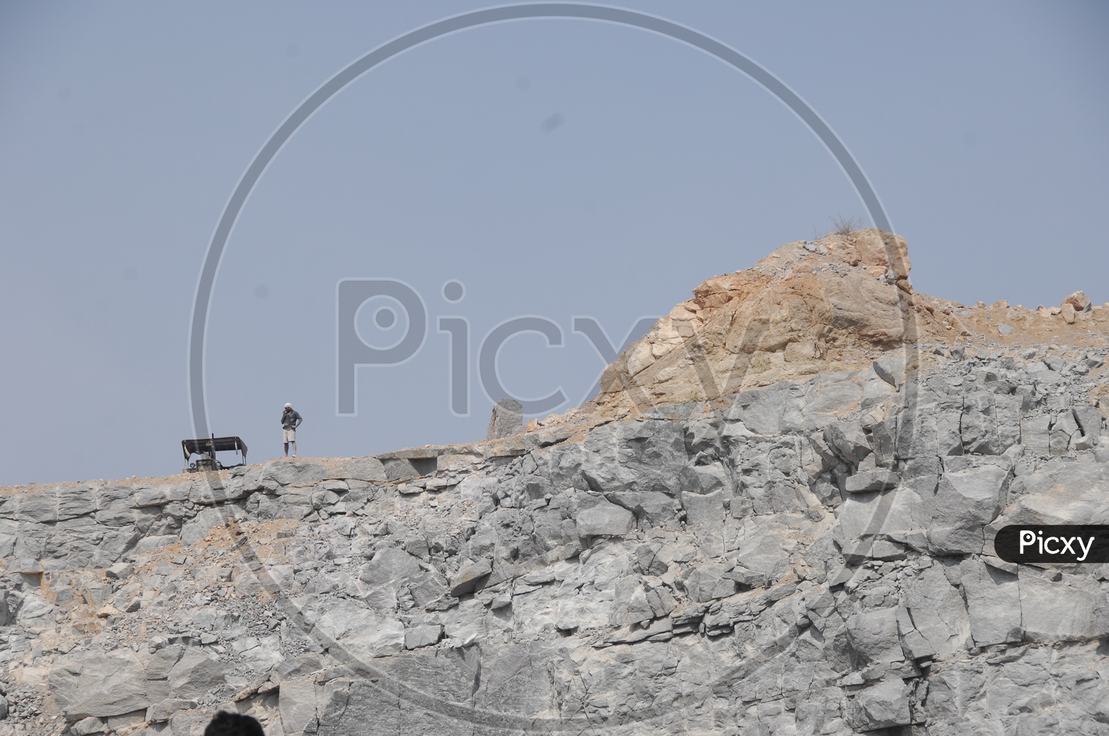 Indian Drilling Worker On a Stone Quarry