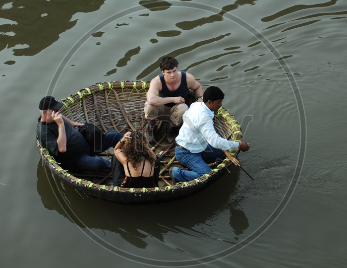 Foreigners on Indian Coracle Boats