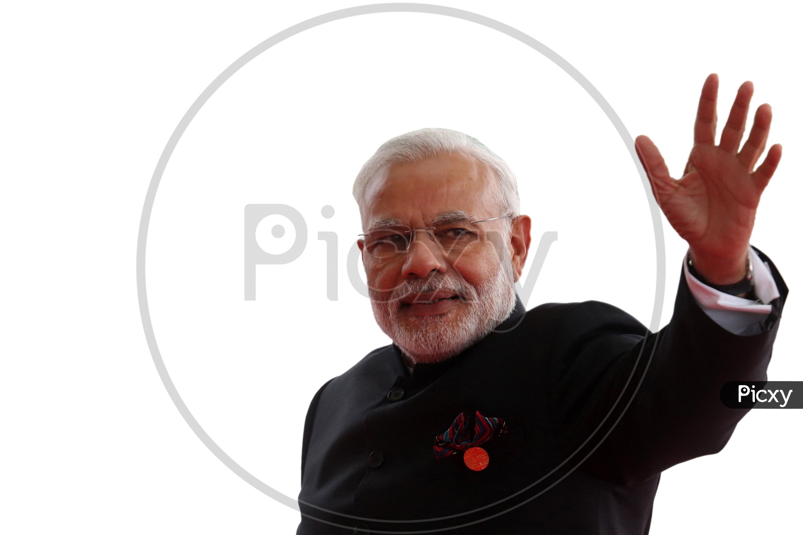 Narendra Modi, The Prime Minister of India waving his hand at supporters with white background