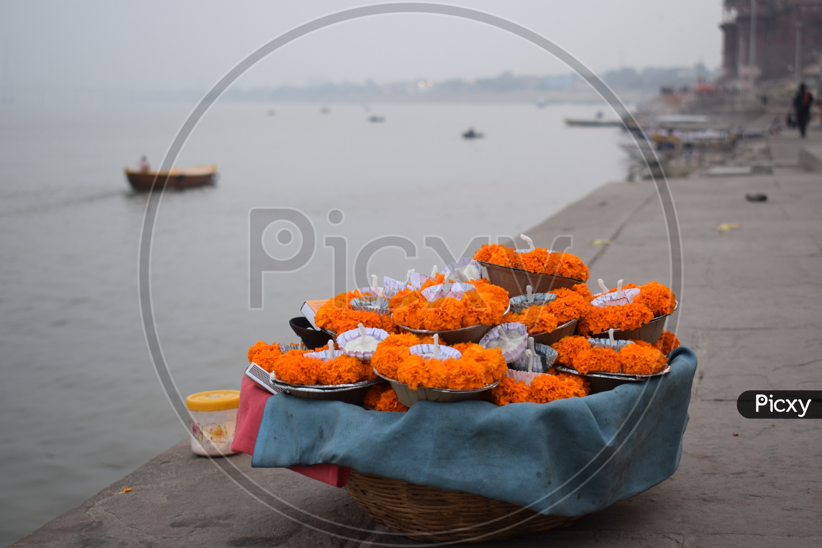 Diyas and flowers to be offered to river Ganga at Varanasi
