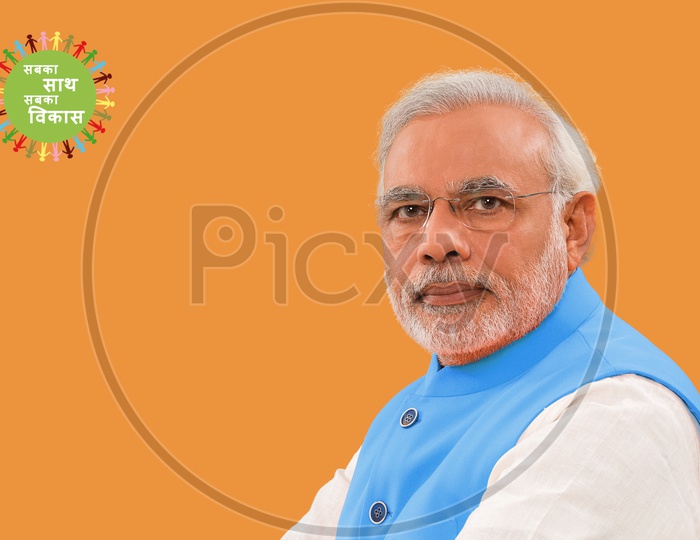 Closeup illustration shot of Narendra Modi, The 14th Prime Minister of India in blue suit with sabka saath sabka vikas campaign logo in orange background