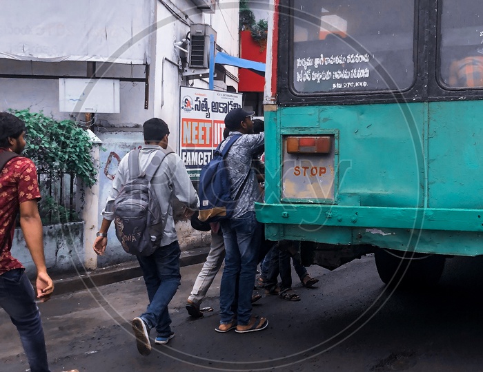 College Students catching the APSRTC Bus