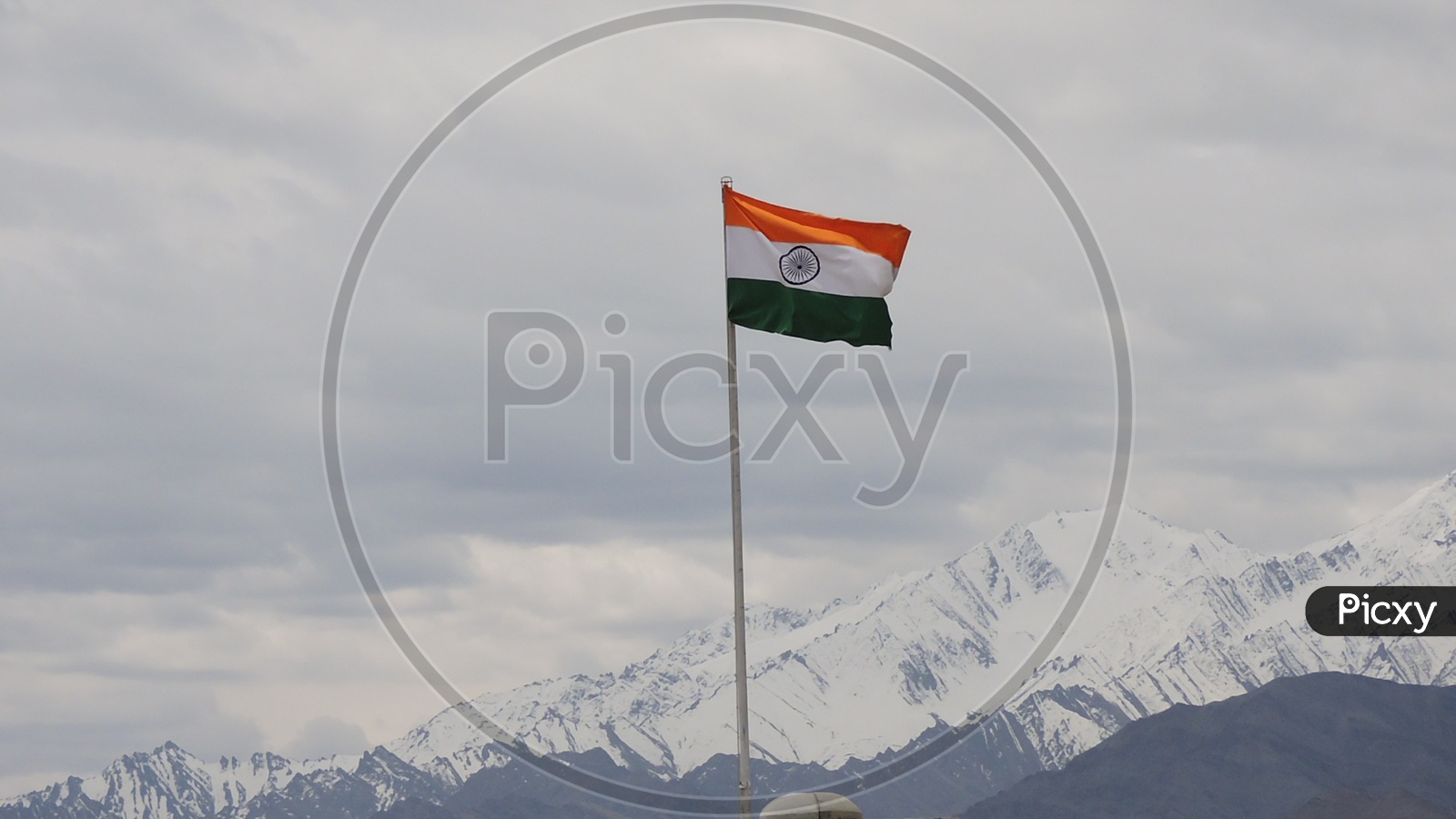 Flying Flag of India amidst the Himalayan mountains.