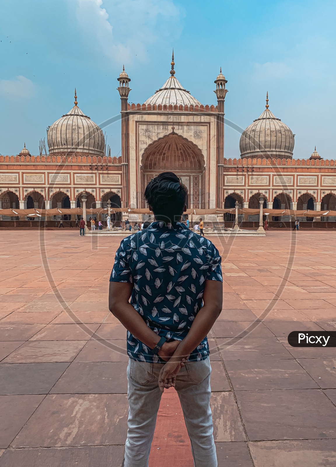 A Tourist taking a picture in front of Jama Masjid