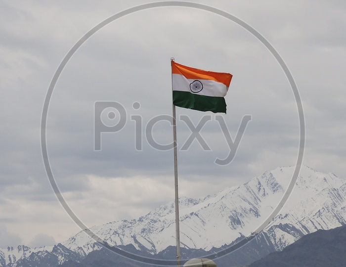 Flying Flag of India amidst the Himalayan mountains.
