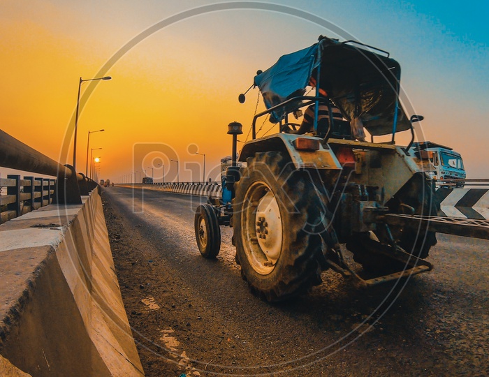 A Tractor passing by the Rajahmundry Fourth Bridge