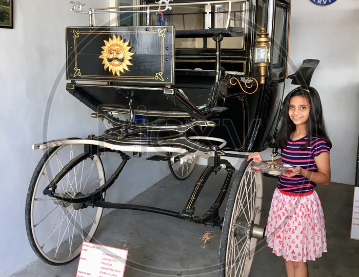 Indian Girl With Dia Thali At an Vintage Cart
