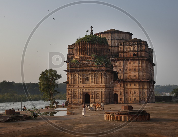 View of Royal cenotaphs (Chhatris) of Orchha over Betwa river. Orchha, Madhya Pradesh, India.