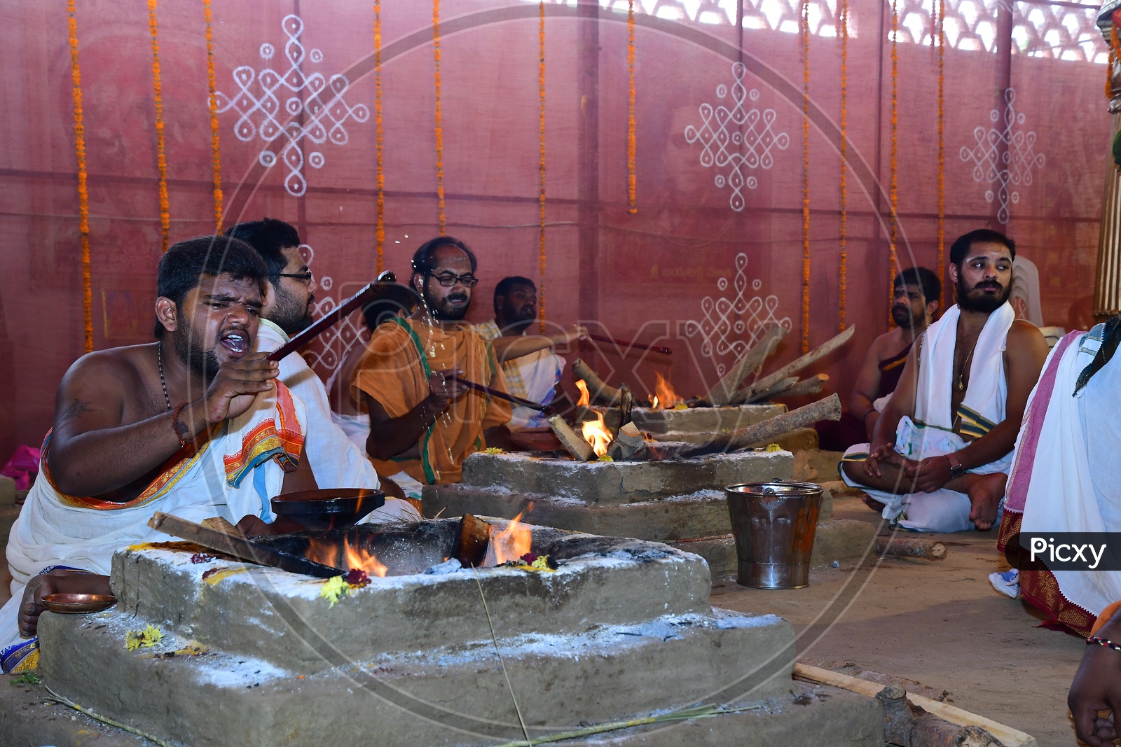 Hindu Priests Performing Homam Or Yaagam
