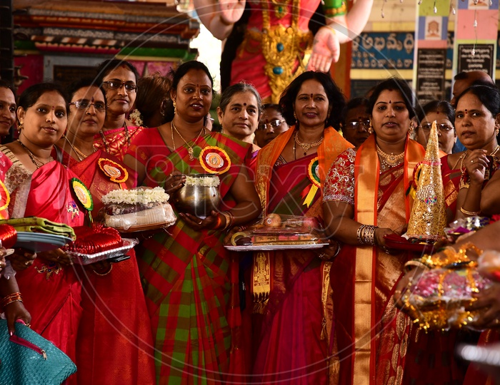 Indian Woman Celebrating Durga Navami or Dussera Navrathrulu At Vijayawada Kanaka Durga Temple