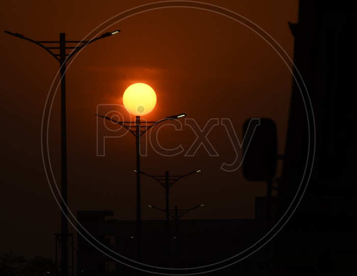Sunset over the street lights of Vijayawada