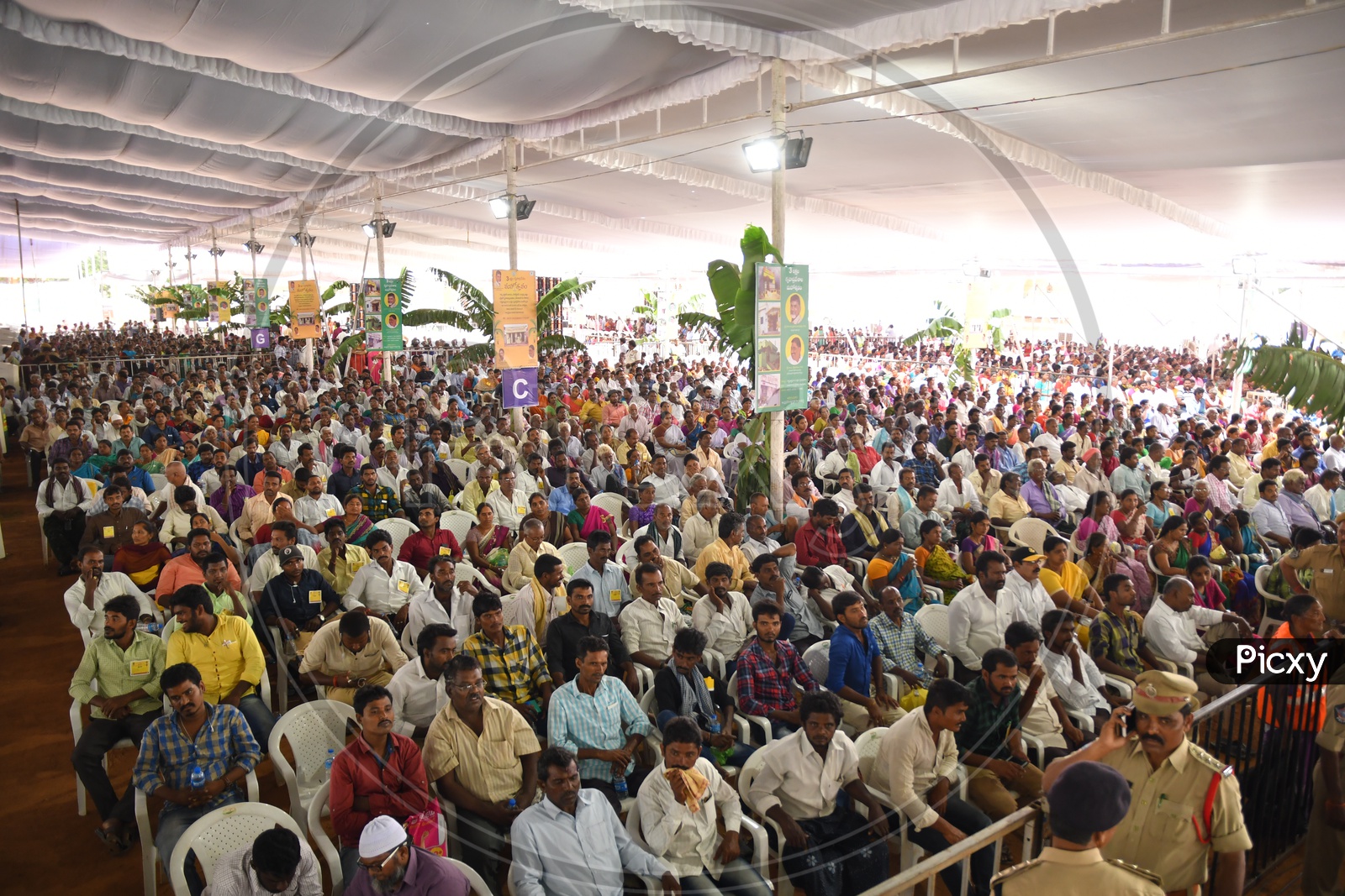 Crowd Of People Attending and Sitting In a Meeting By Andhra Pradesh Meeting