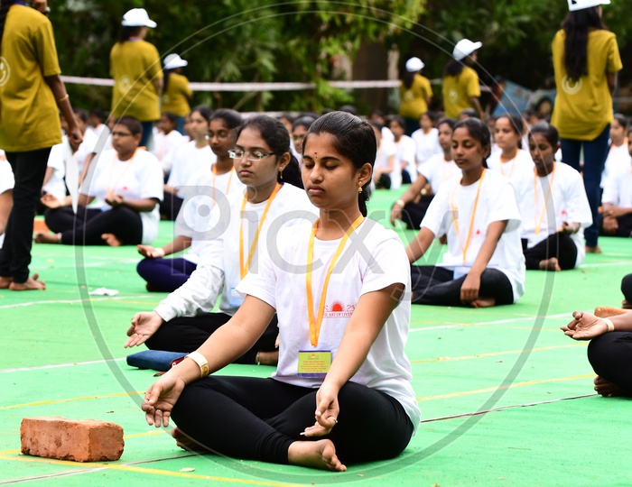 Indian girls during Meditation at Art of Living Happiness Center, Vijayawada