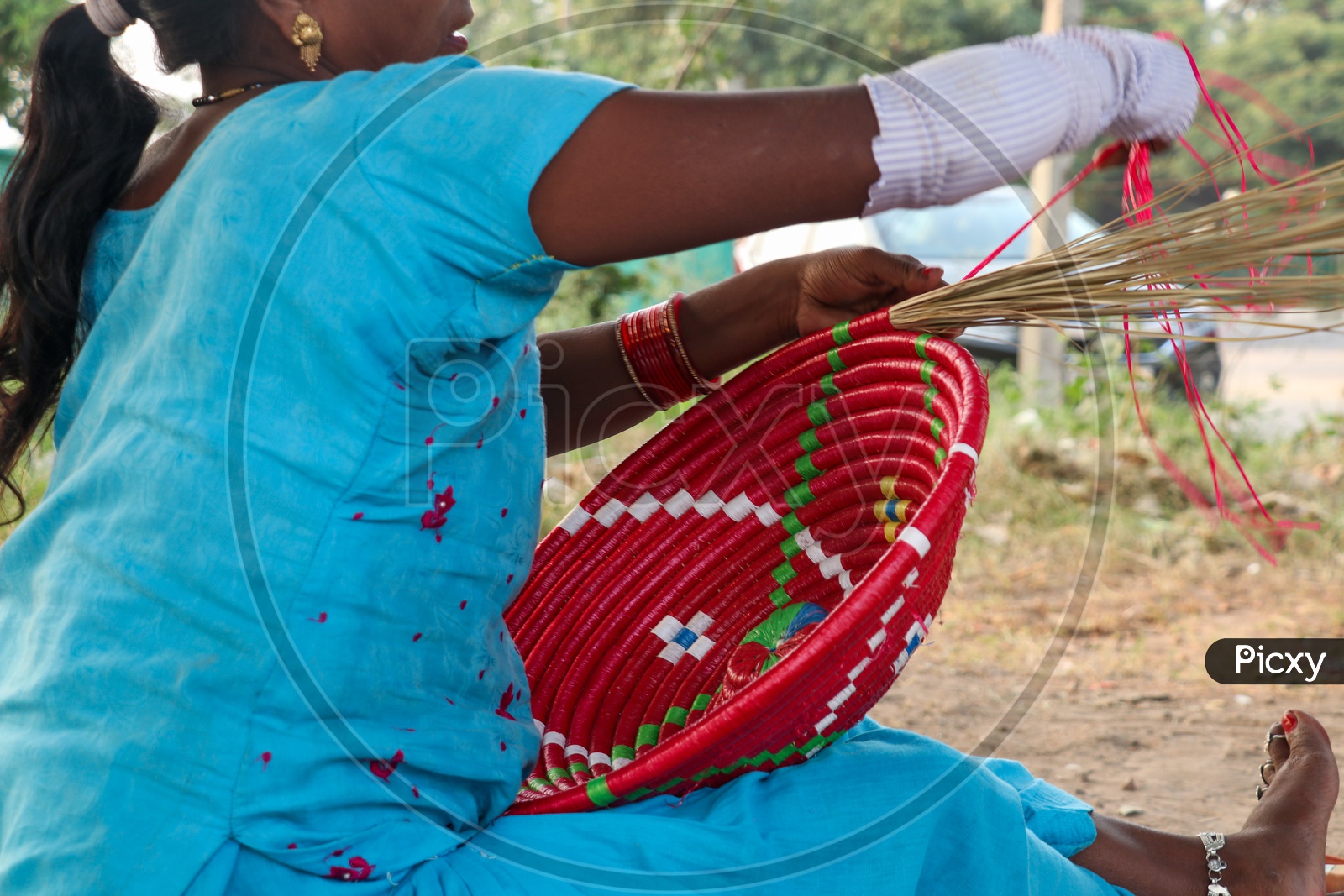 Indian Woman Hand Weaving Baskets