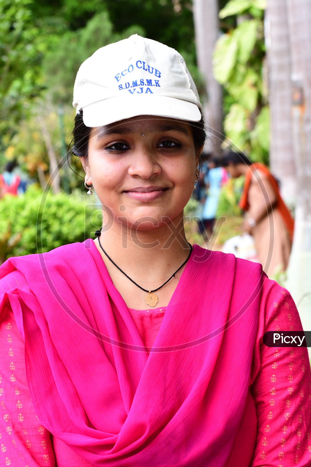 Indian School Girls And Eco Club Members  Wearing Caps