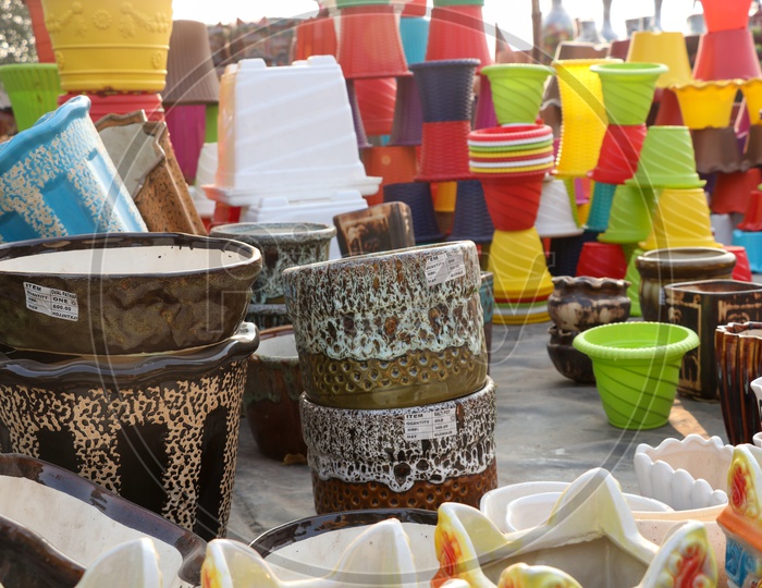 Colorful Plant Pots Being sold At a Road Side Vendor Stall