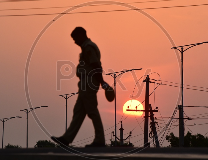 Indian Police Man during sunset