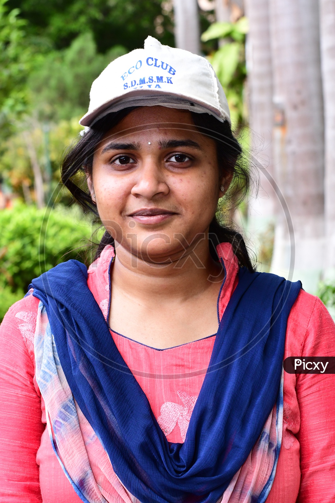 Indian School Girls And Eco Club Members  Wearing Caps