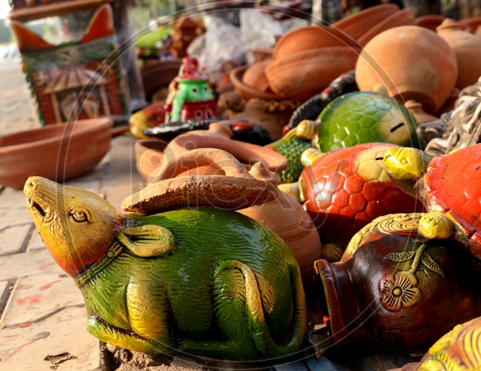 Clay Made Piggy Banks Selling at a Road Side Vendor Stall
