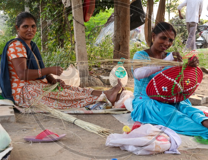 Indian Artists Making or Weaving  a Handmade Basket